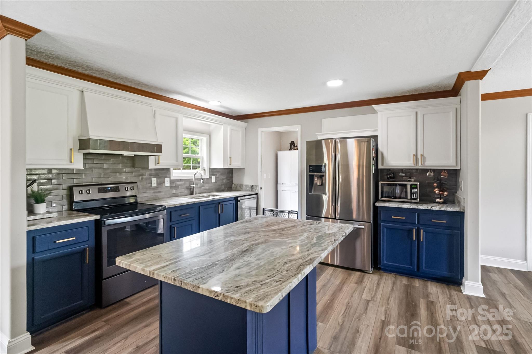 2021 Beamguard Road Clover, SC 29710 - Photo 6 of 33 a kitchen with stainless steel appliances granite countertop a stove refrigerator sink and microwave