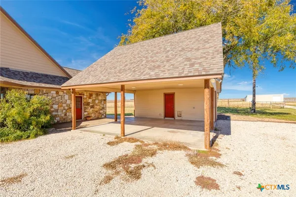 a view of a house with a swimming pool