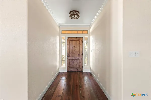 a view of a livingroom with a staircase
