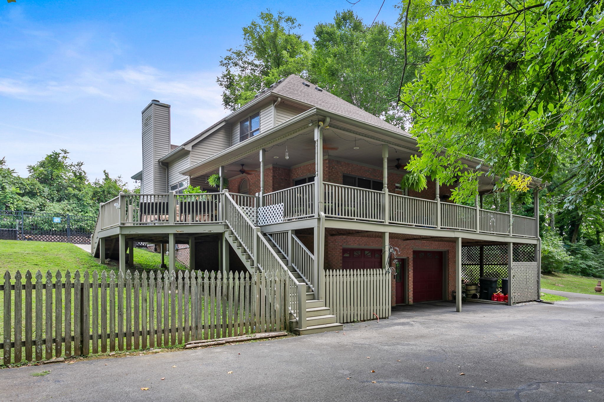 830 Baker Road Columbia, TN 38401 - Photo 49 of 68 a front view of house with deck and yard