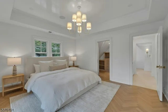 a bathroom with double vanity sinks and a mirror