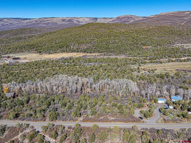 a view of ocean with a mountain