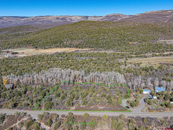 a view of beach and mountain