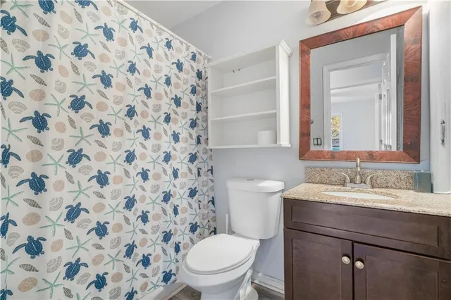 a bathroom with a sink and a toilet