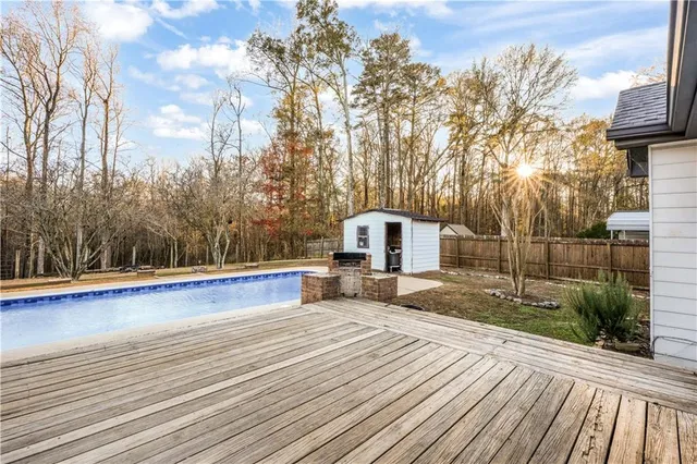 a view of a backyard with a patio