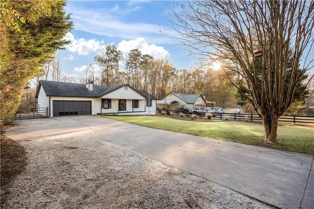 a view of house with outdoor space and street view
