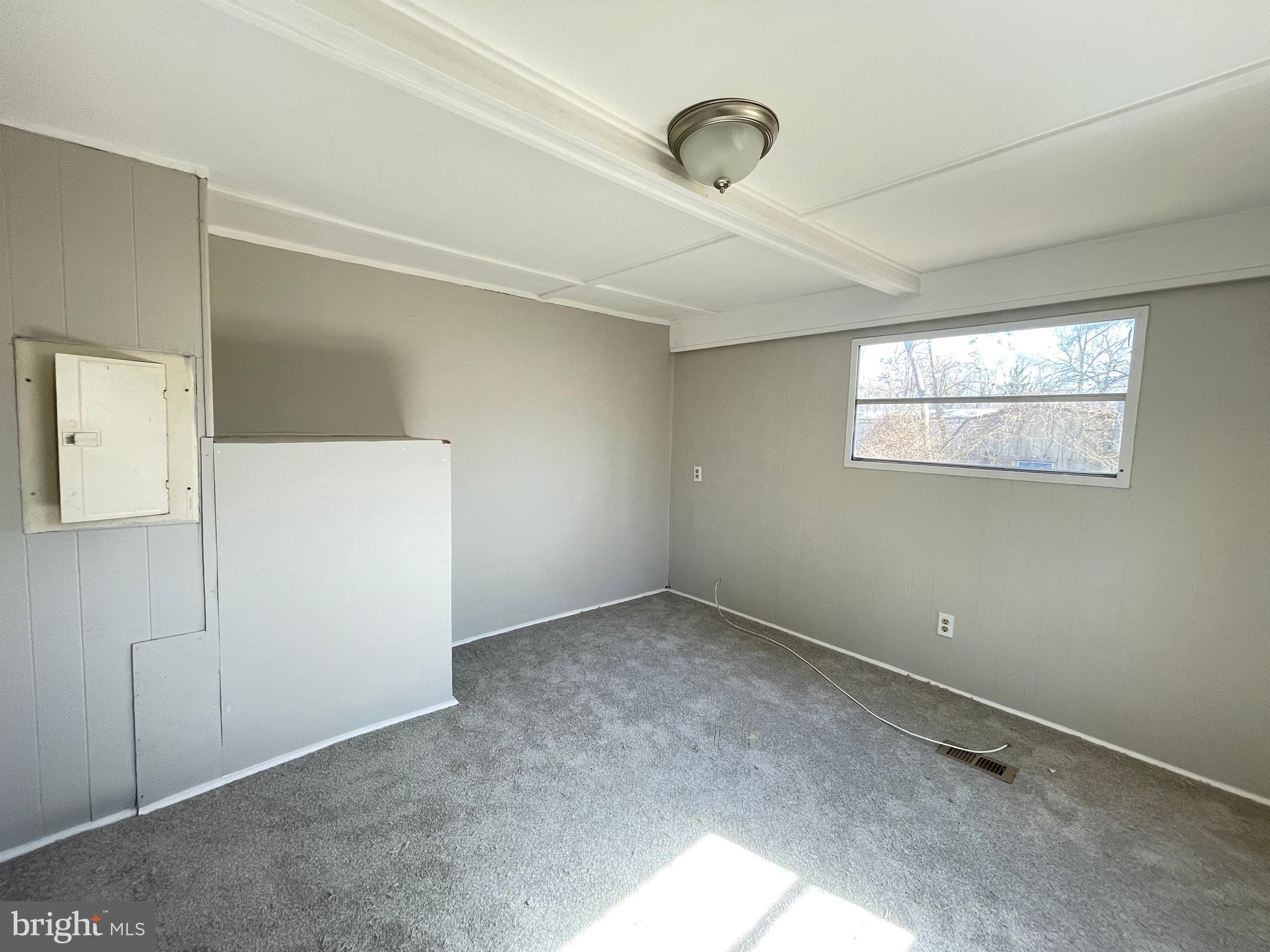 542 Gooseberry Road Millville, NJ 08332 - Photo 14 of 16 an empty room with windows