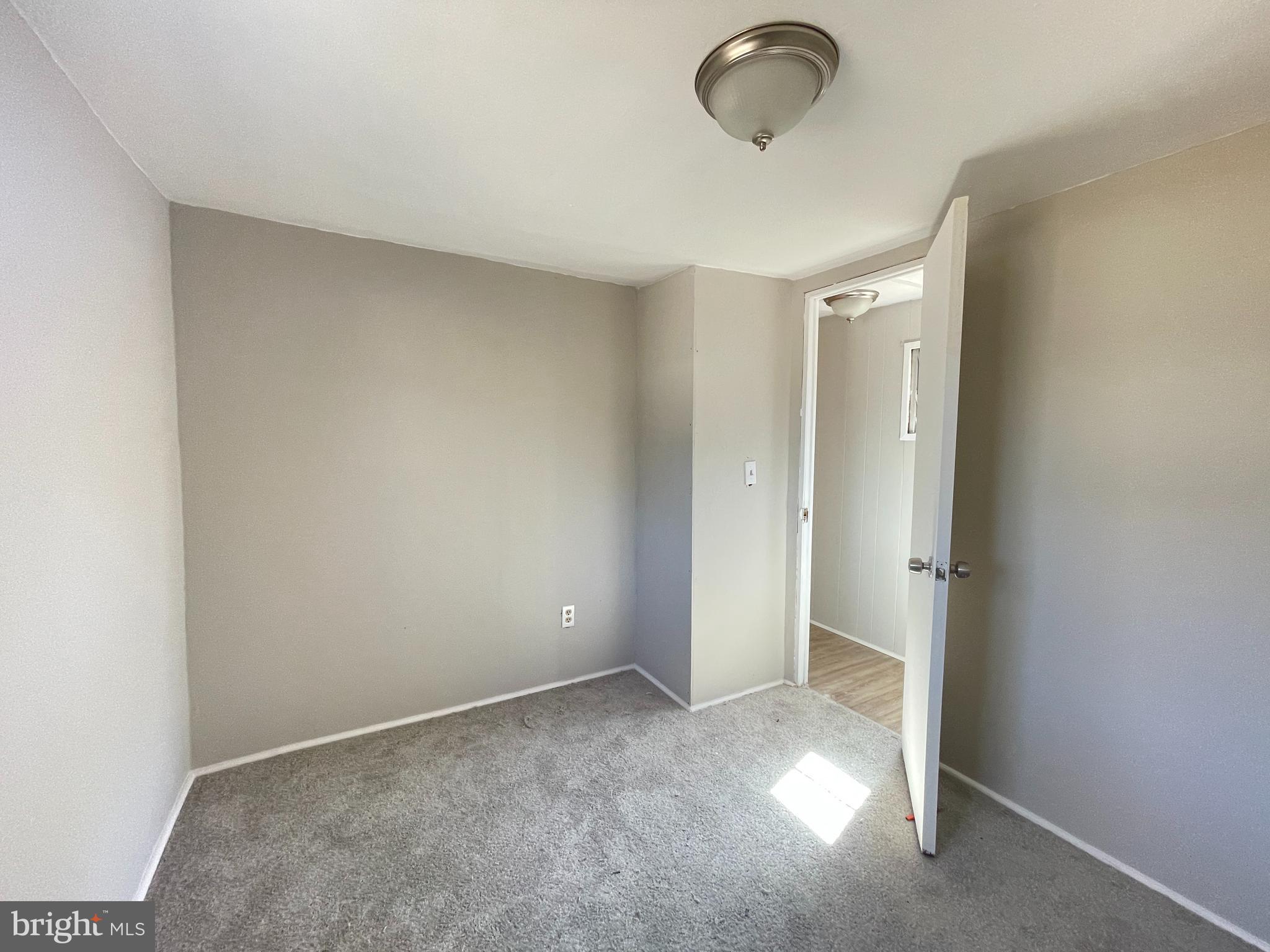542 Gooseberry Road Millville, NJ 08332 - Photo 9 of 16 a view of a room with wooden floor