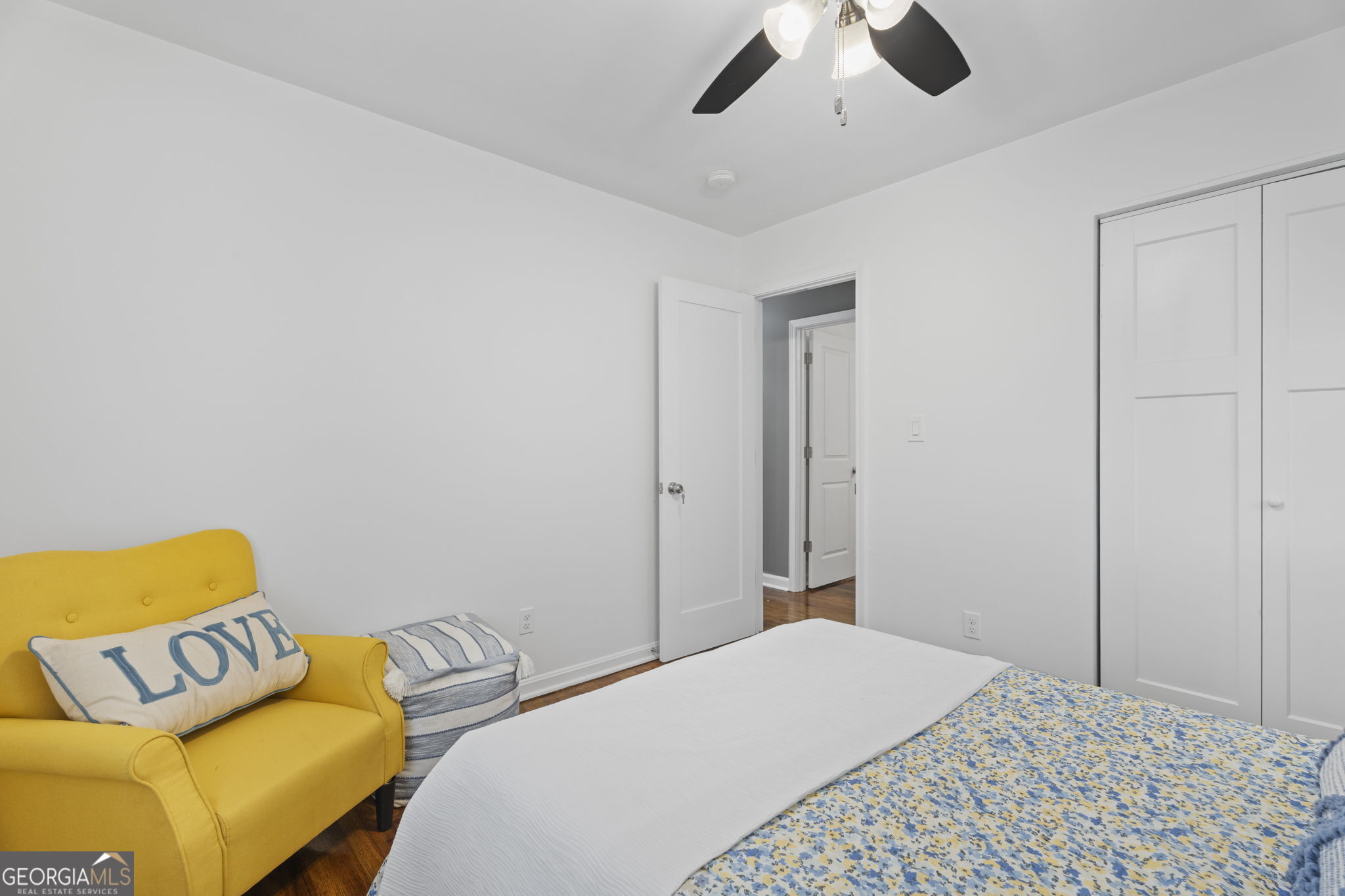 3567 Forrest Park Road Southeast Atlanta, GA 30354 - Photo 18 of 29 a bedroom with a bed and ceiling fan