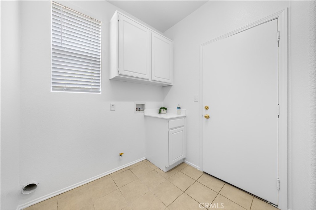 8679 Cabin Place Riverside, CA 92508 - Photo 12 of 35 a view of storage and utility room with a window