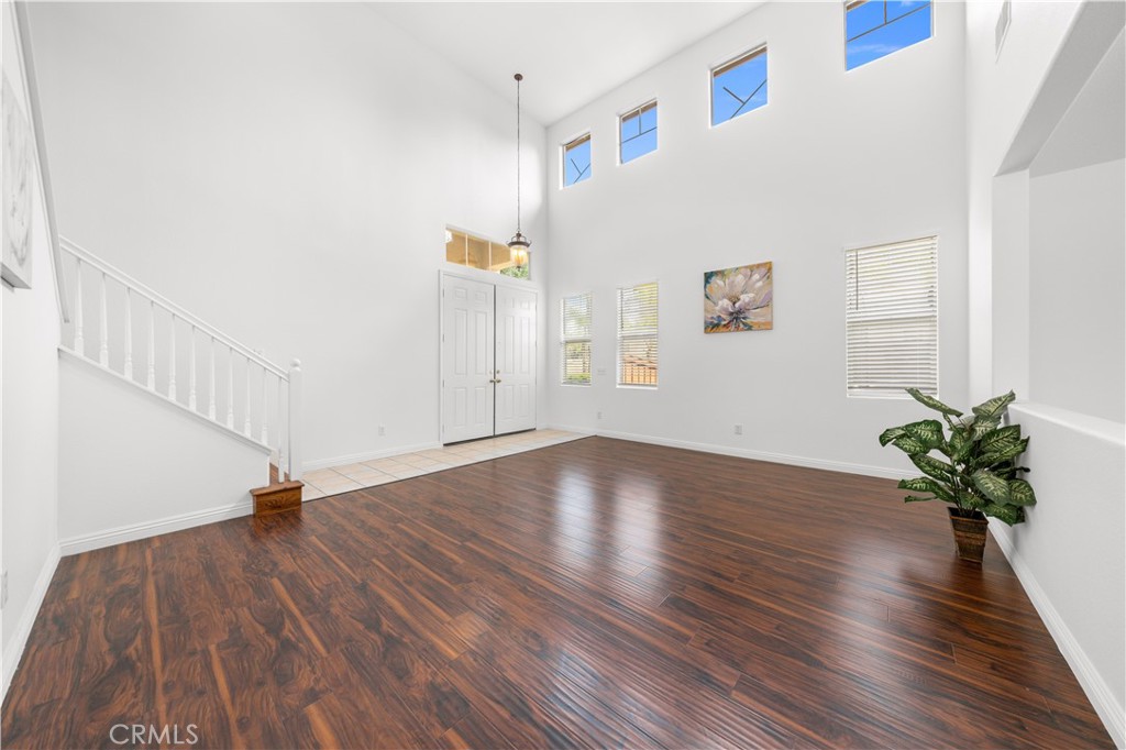8679 Cabin Place Riverside, CA 92508 - Photo 4 of 35 a view of empty room with wooden floor