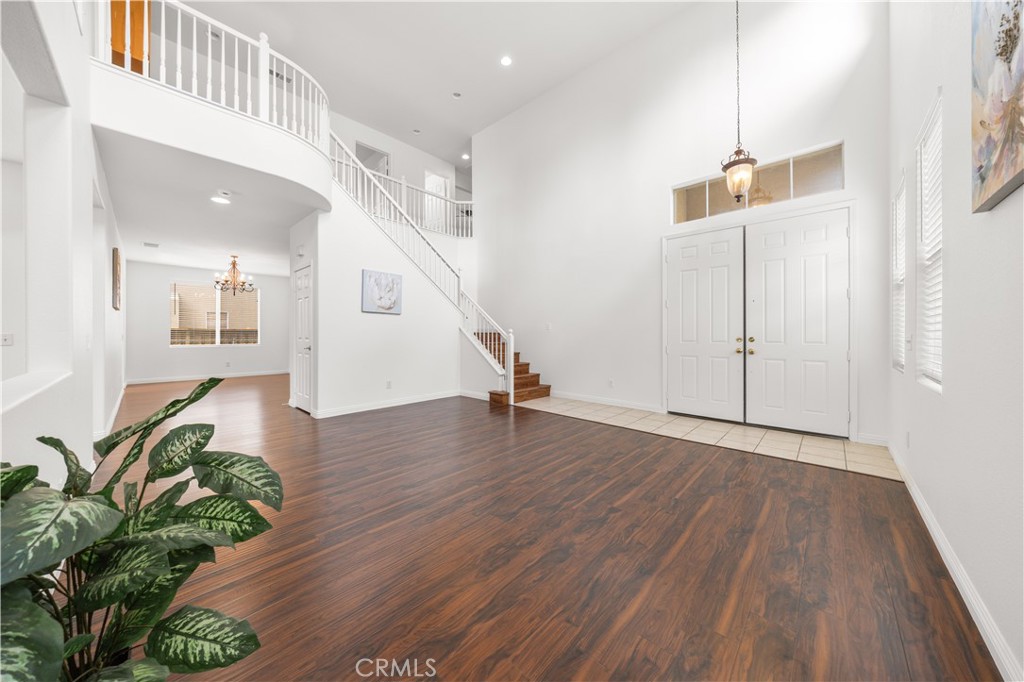 8679 Cabin Place Riverside, CA 92508 - Photo 5 of 35 a view of an entryway with wooden floor