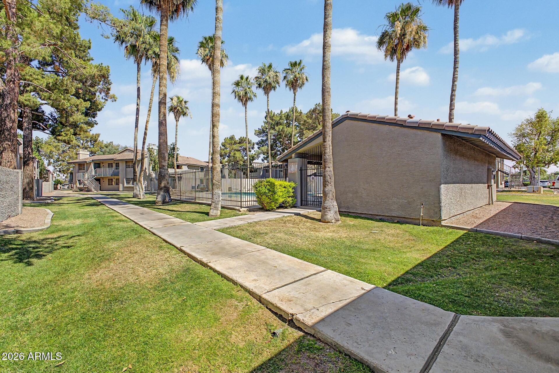 533 West Guadalupe Road, Unit 1104 Mesa, AZ 85210 - Photo 16 of 20 a view of a backyard