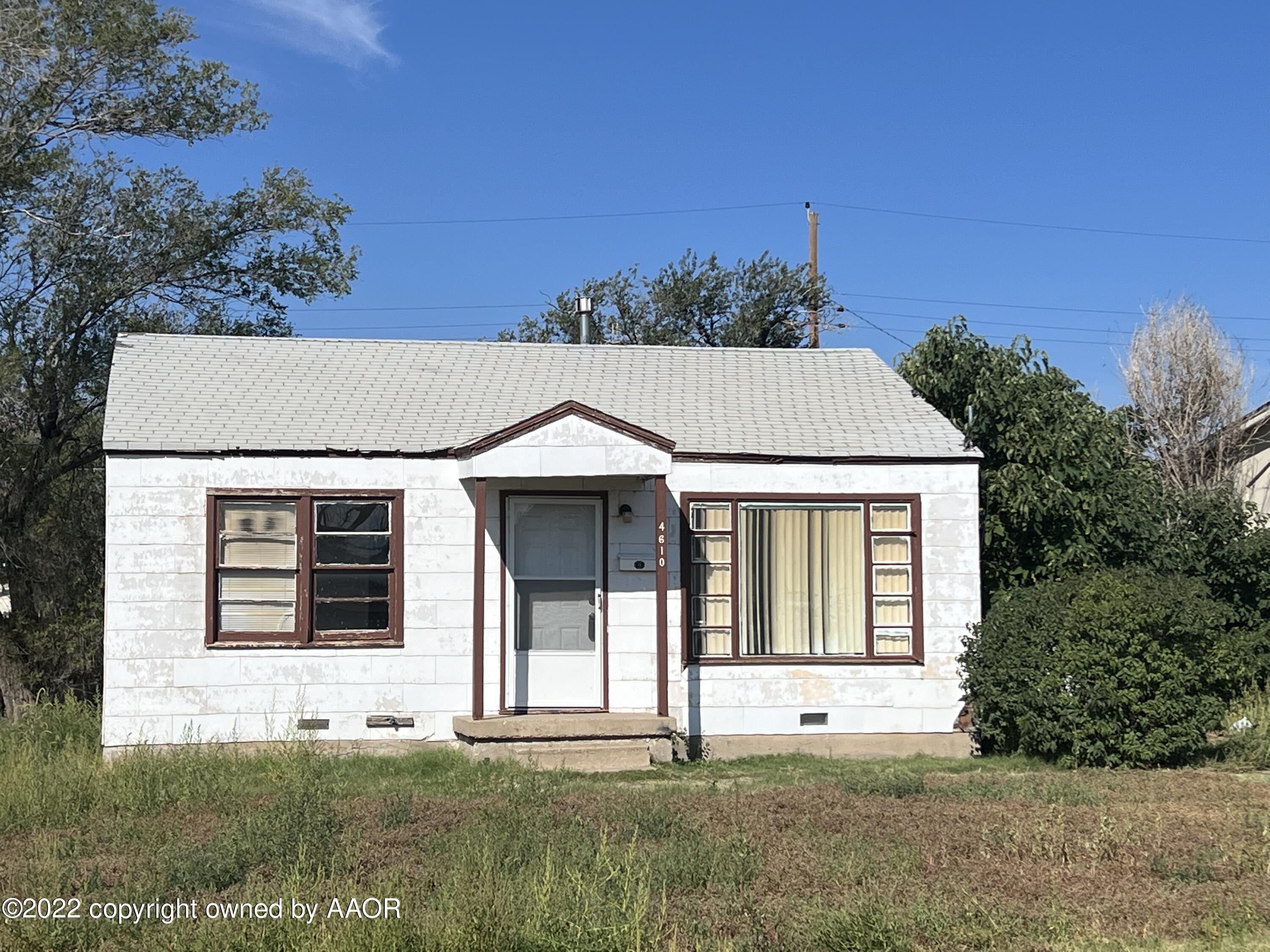 4610 South Ong Street Amarillo, TX 79110 - Photo 1 of 1 a front view of a house with a yard