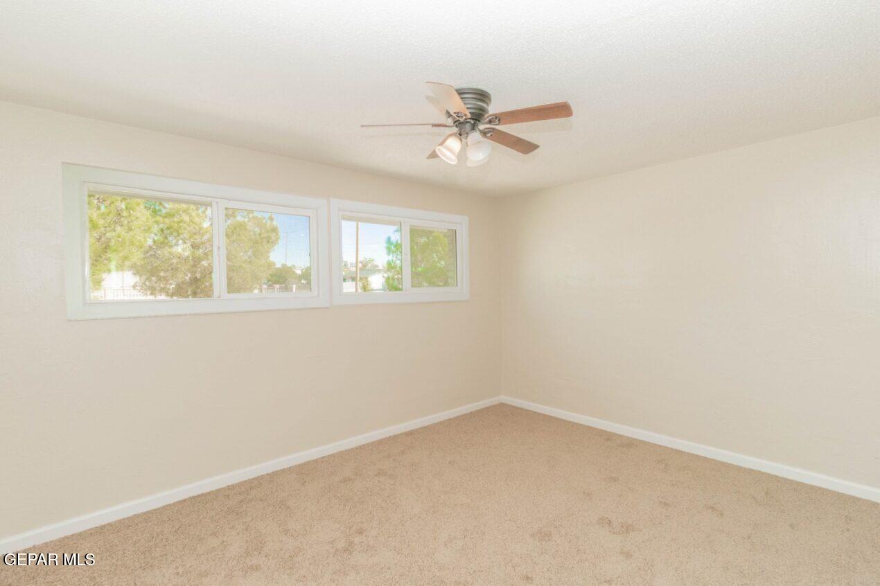 6240 Cibolo Court El Paso, TX 79905 - Photo 22 of 50 an empty room with a window
