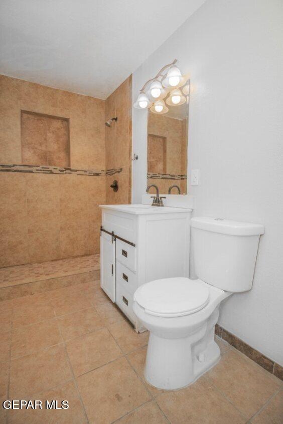 6240 Cibolo Court El Paso, TX 79905 - Photo 27 of 50 a bathroom with a toilet sink and mirror