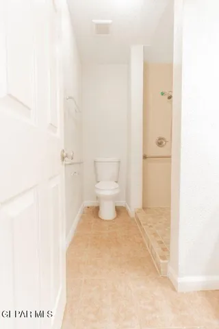 a bathroom with a toilet
