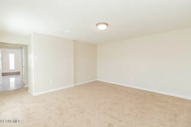 an empty room with an entryway