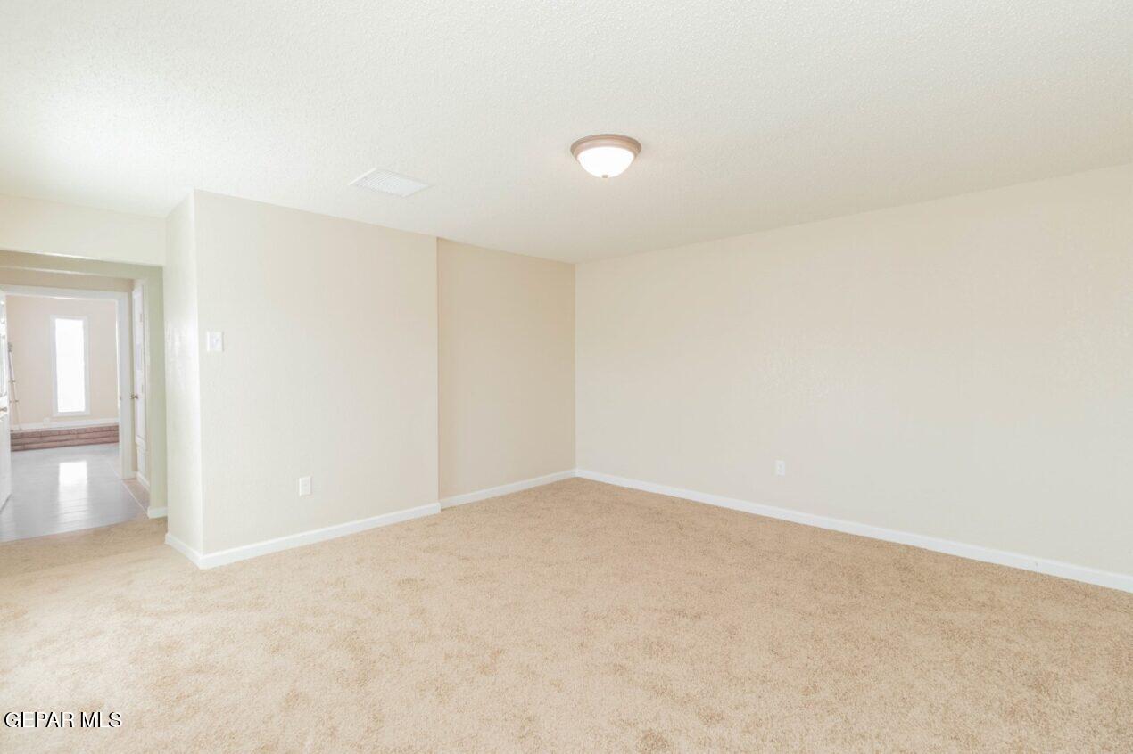 6240 Cibolo Court El Paso, TX 79905 - Photo 34 of 50 an empty room with an entryway