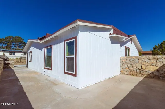 a front view of a house with a garage