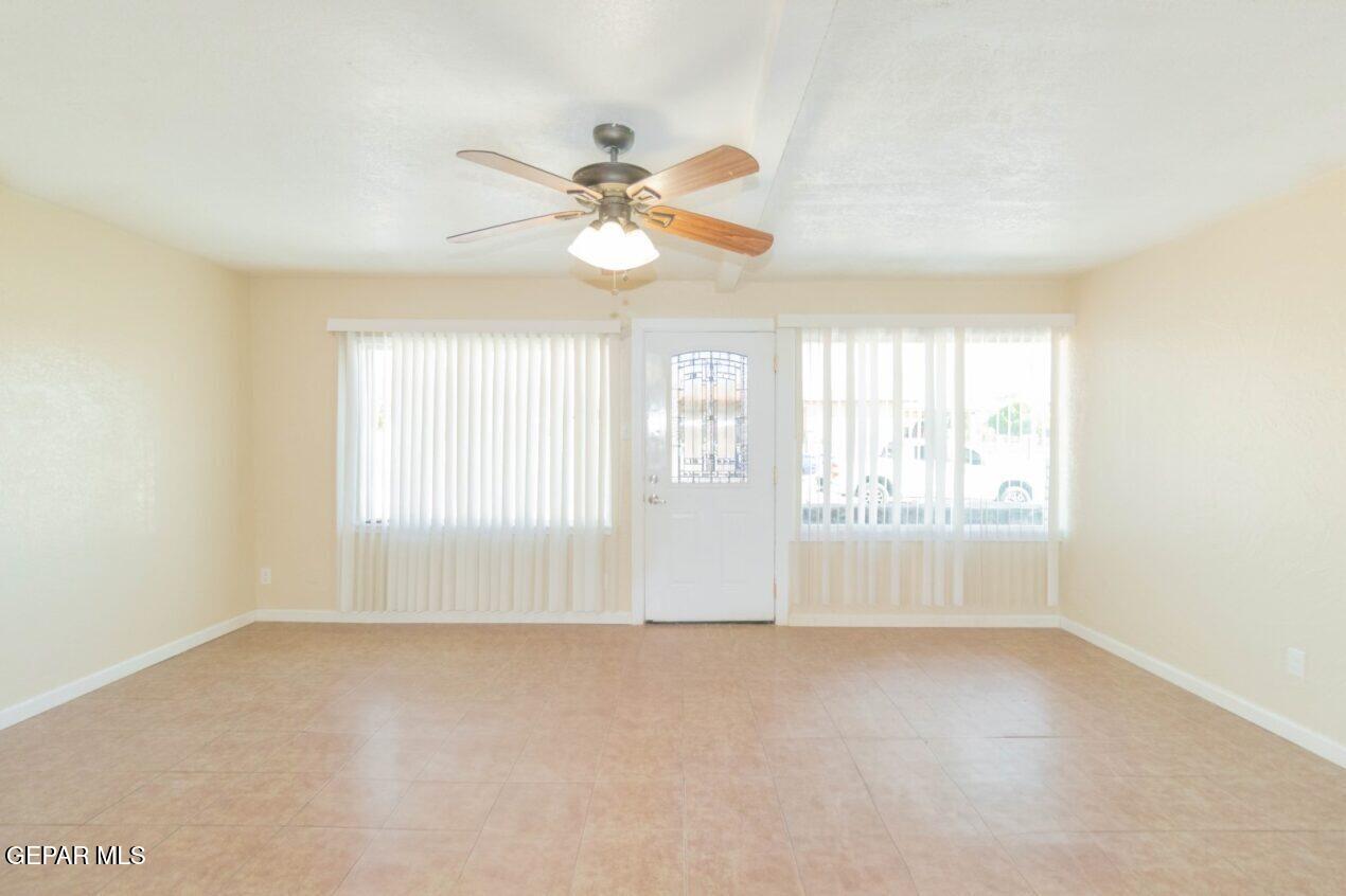 6240 Cibolo Court El Paso, TX 79905 - Photo 7 of 50 a view of an empty room with a window