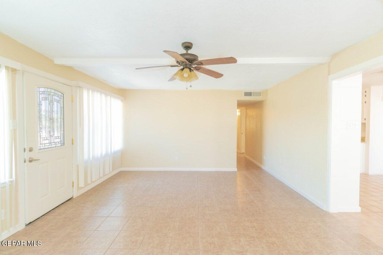 6240 Cibolo Court El Paso, TX 79905 - Photo 8 of 50 a view of a room with a window and a ceiling fan