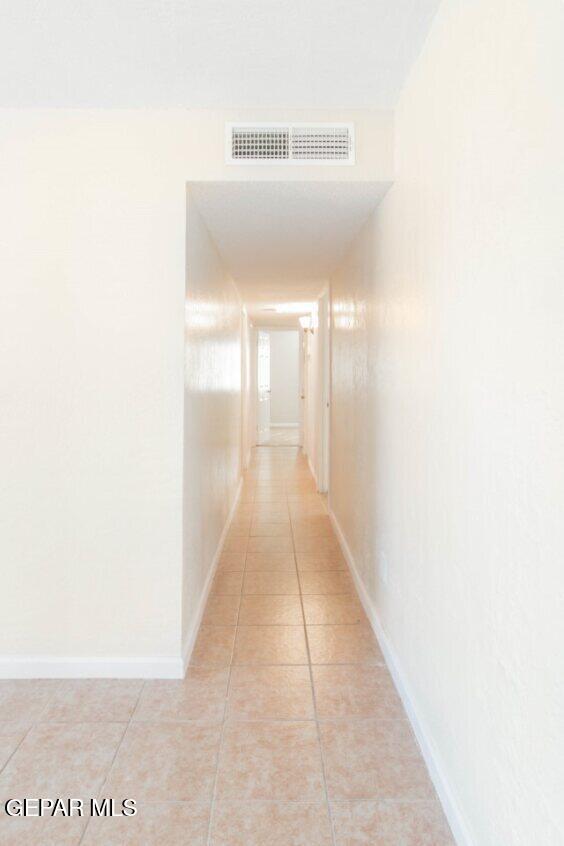 6240 Cibolo Court El Paso, TX 79905 - Photo 10 of 50 a hallway with a white walls
