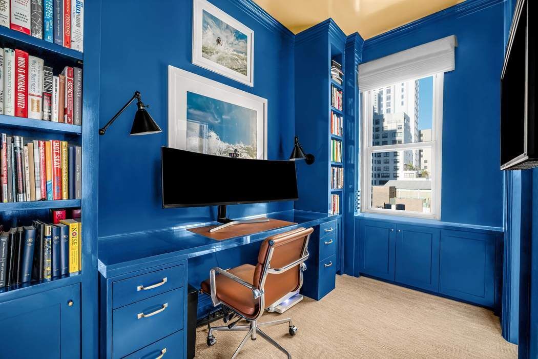 215 East 72nd Street, Unit 10W Manhattan, NY 10021 - Photo 12 of 14 a view of a workspace with furniture