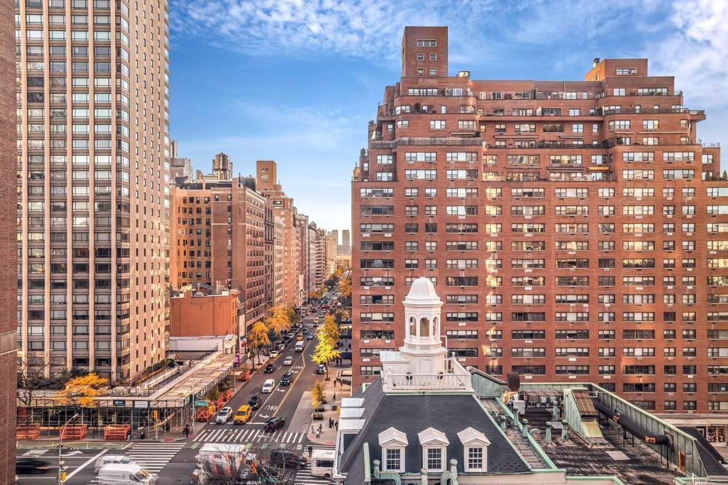 215 East 72nd Street, Unit 10W Manhattan, NY 10021 - Photo 13 of 14 a city view with tall buildings