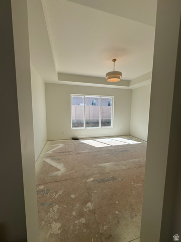 389 West 2100 South Perry, UT 84302 - Photo 21 of 21 Tray ceiling with crown molding, contemporary drum pendant light, and triple window
