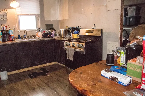 a kitchen with sink and window