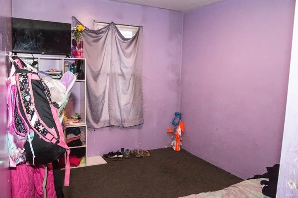 a kitchen with a sink appliances and cabinets