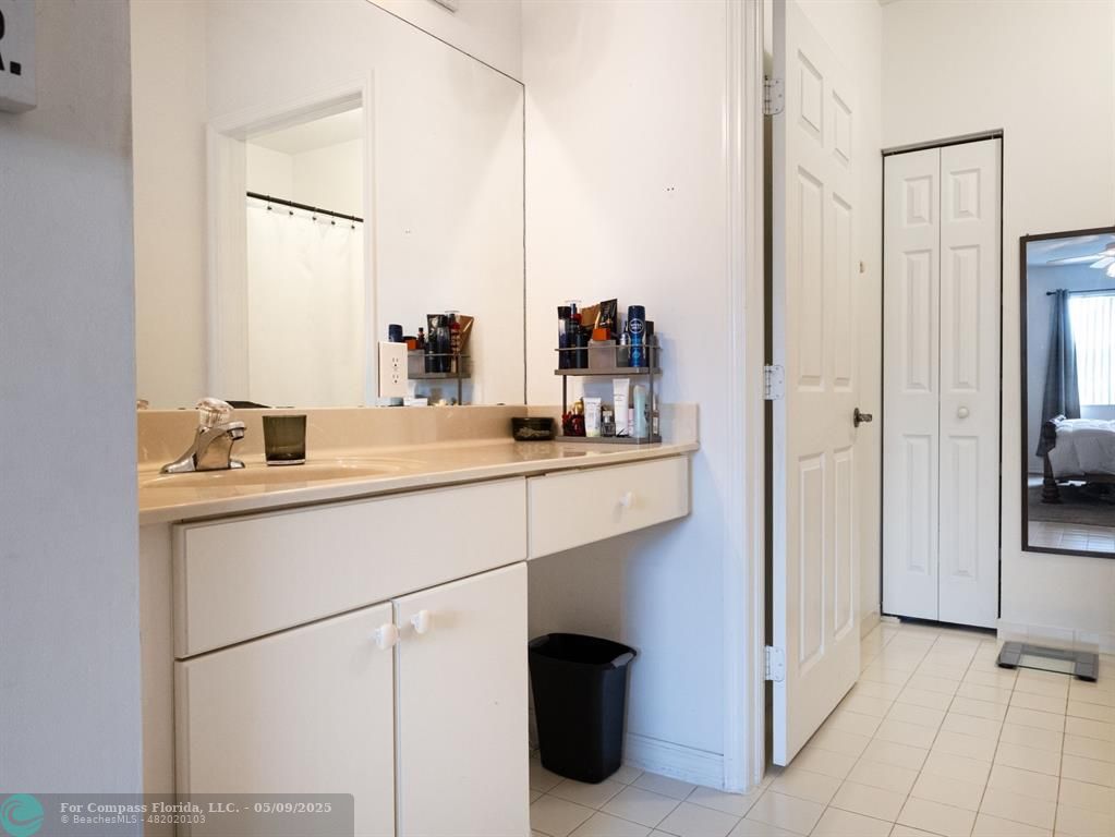 5048 Southwest 136th Avenue Miramar, FL 33027 - Photo 21 of 49 a bathroom with a sink and a mirror