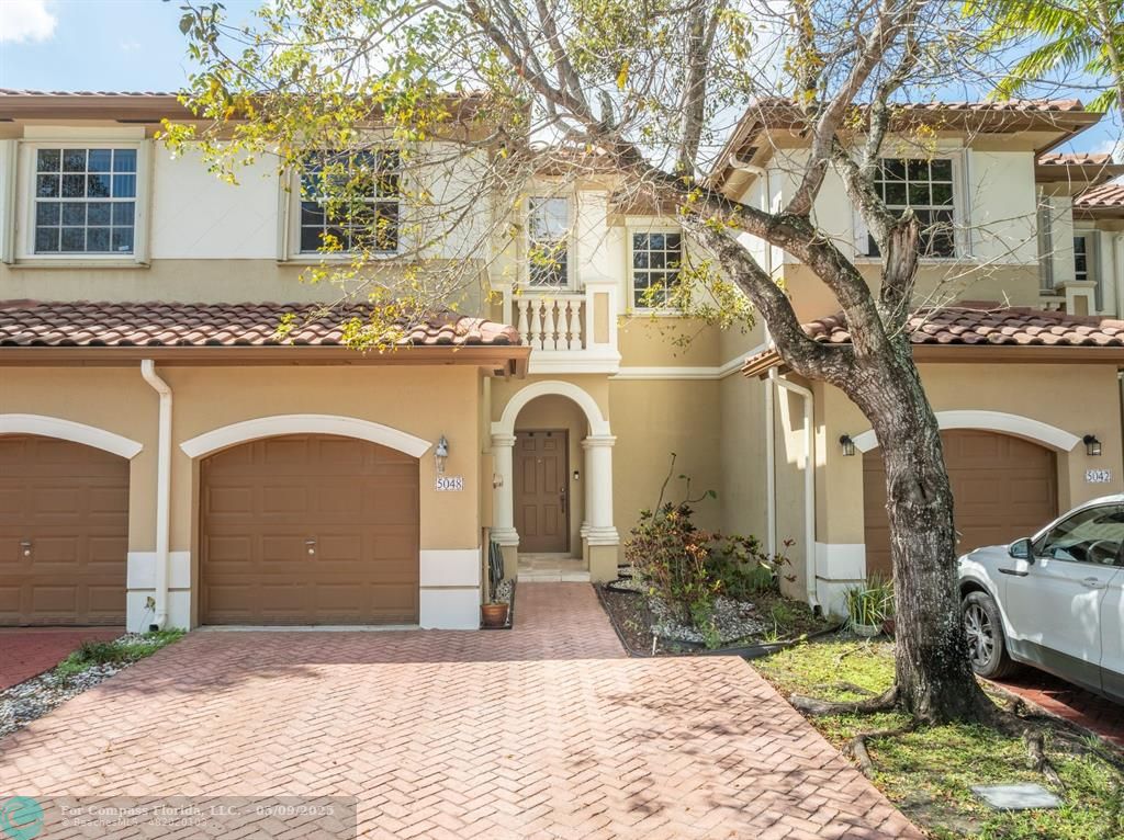 5048 Southwest 136th Avenue Miramar, FL 33027 - Photo 30 of 49 a front view of a house
