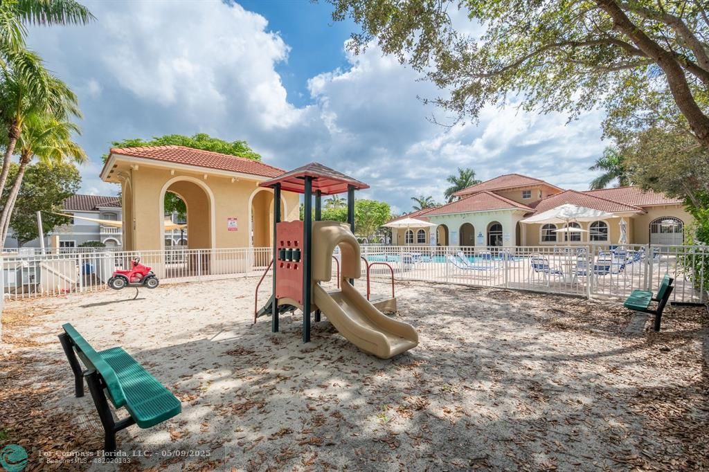 5048 Southwest 136th Avenue Miramar, FL 33027 - Photo 38 of 49 a front view of house with a garden
