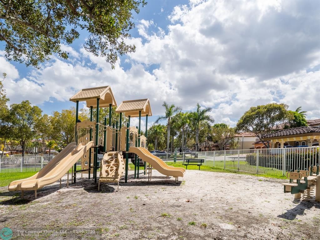 5048 Southwest 136th Avenue Miramar, FL 33027 - Photo 43 of 49 a view of a park with a slide