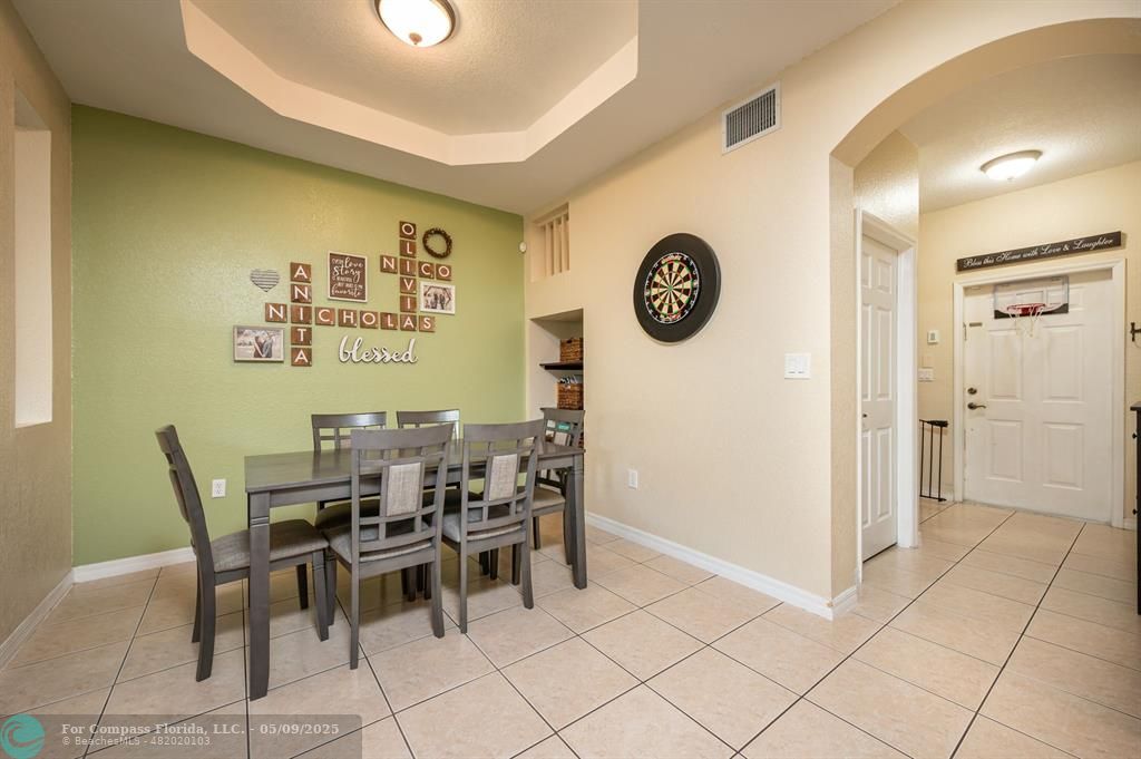 5048 Southwest 136th Avenue Miramar, FL 33027 - Photo 5 of 49 a view of a dining area with furniture