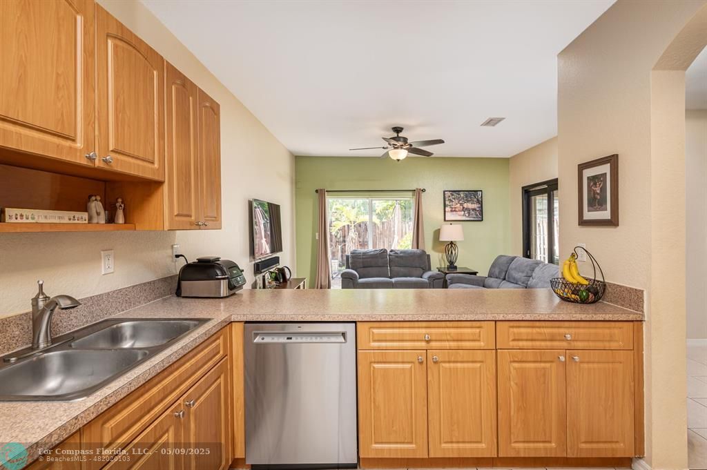 5048 Southwest 136th Avenue Miramar, FL 33027 - Photo 7 of 49 a kitchen with sink and cabinets