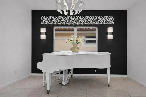 a view of a dining room with furniture