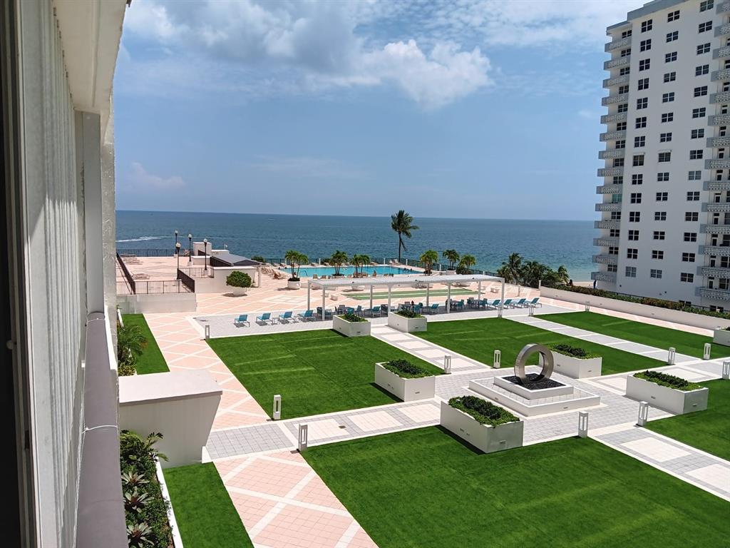 4280 Galt Ocean Drive, Unit 4G Fort Lauderdale, FL 33308 - Photo 12 of 24 a view of a swimming pool with lounge chairs