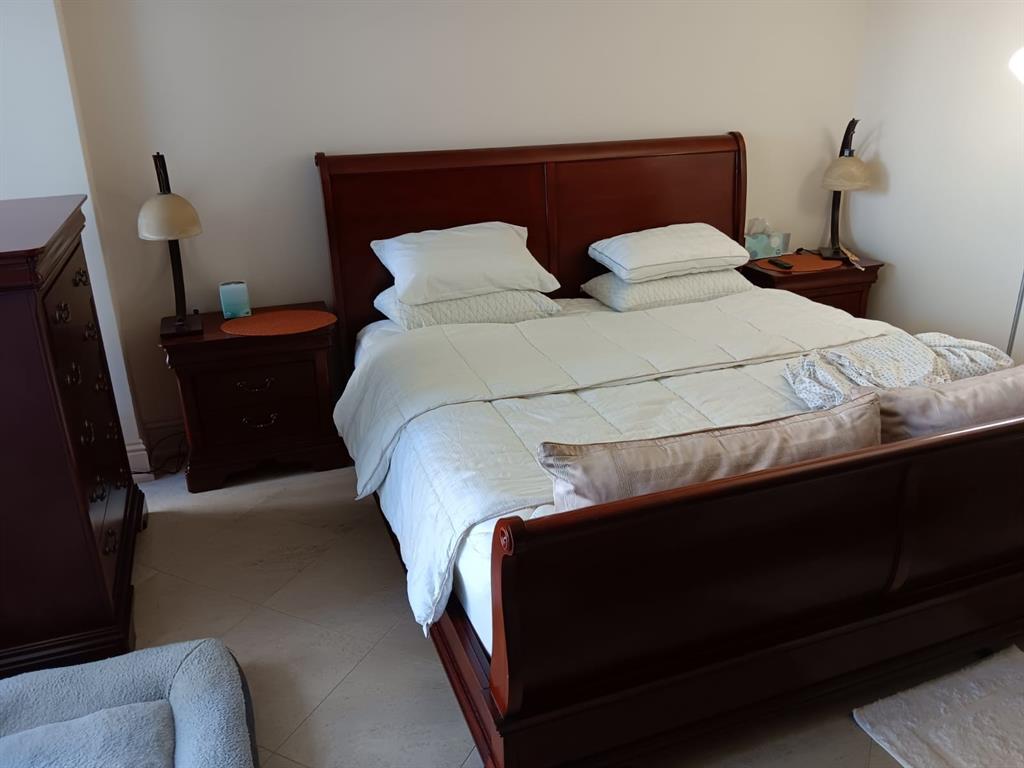 4280 Galt Ocean Drive, Unit 4G Fort Lauderdale, FL 33308 - Photo 8 of 24 a bedroom with a bed and a dresser