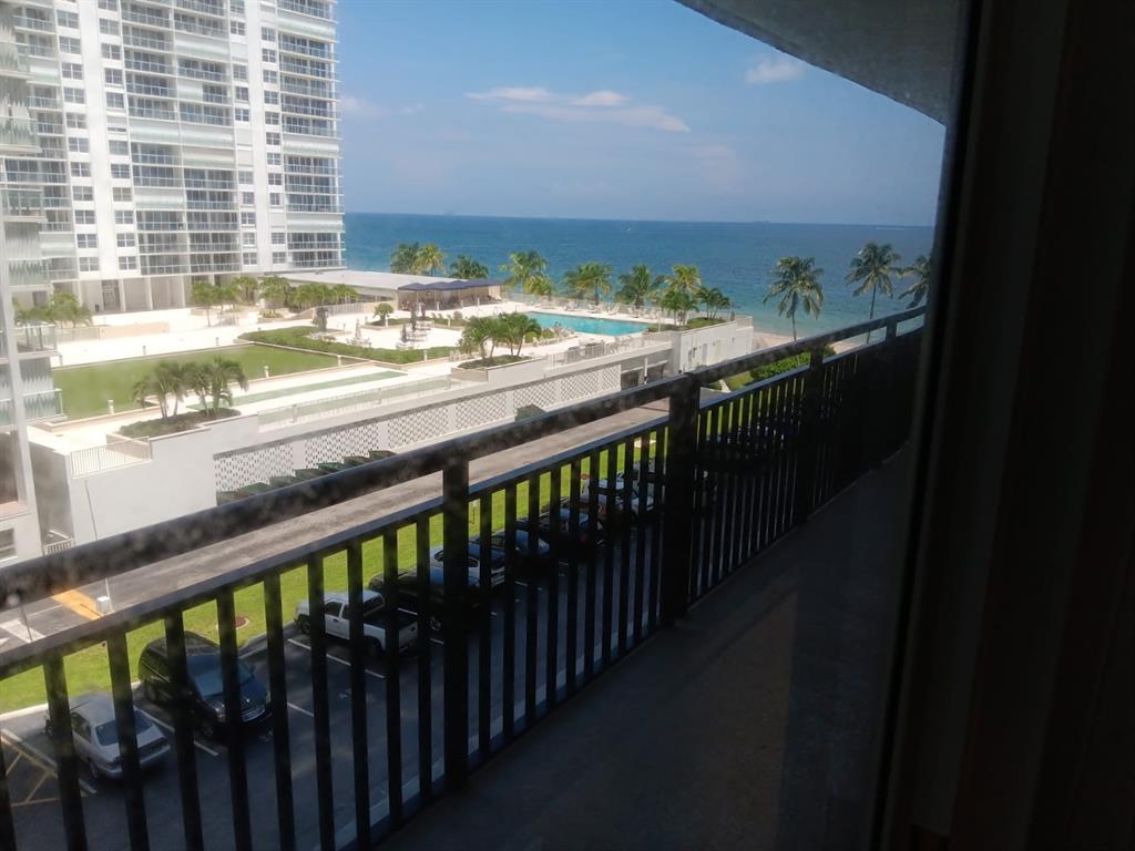 4280 Galt Ocean Drive, Unit 4G Fort Lauderdale, FL 33308 - Photo 10 of 24 a view of a balcony with wooden floor and outdoor space