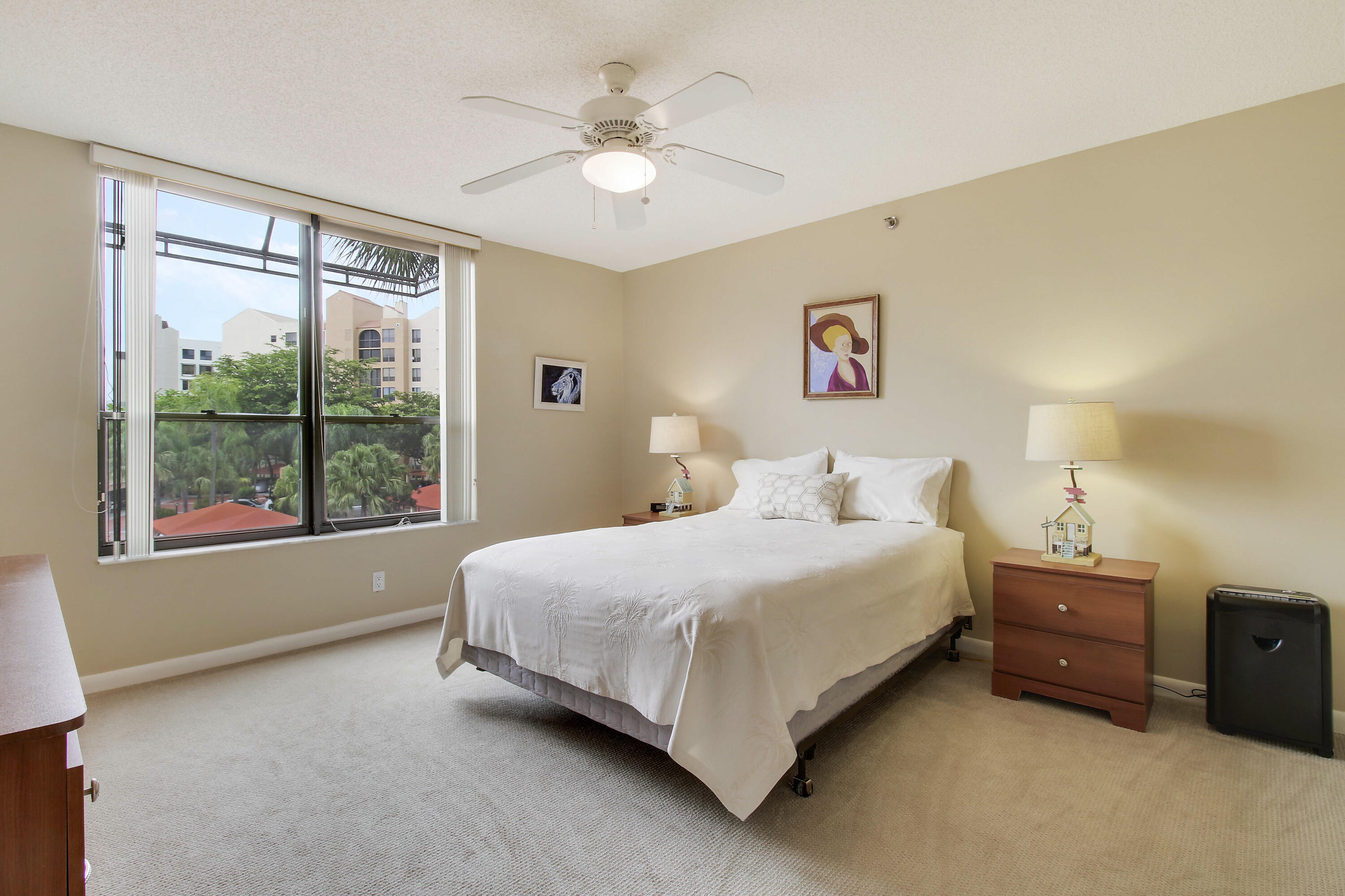 7201 Promenade Drive, Unit 301 Boca Raton, FL 33433 - Photo 23 of 40 a spacious bedroom with a bed and a window