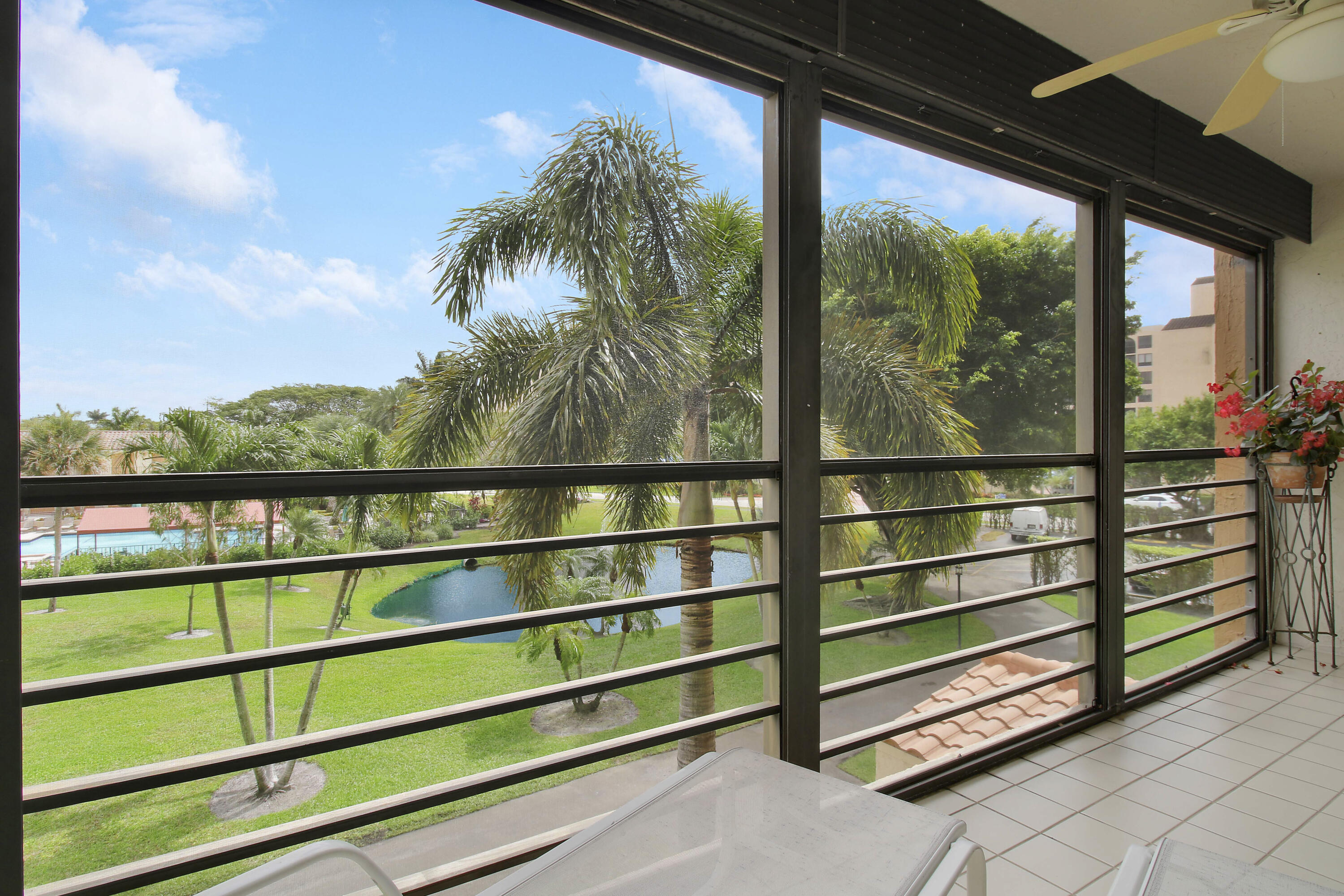 7201 Promenade Drive, Unit 301 Boca Raton, FL 33433 - Photo 29 of 40 a view of a balcony with outdoor space