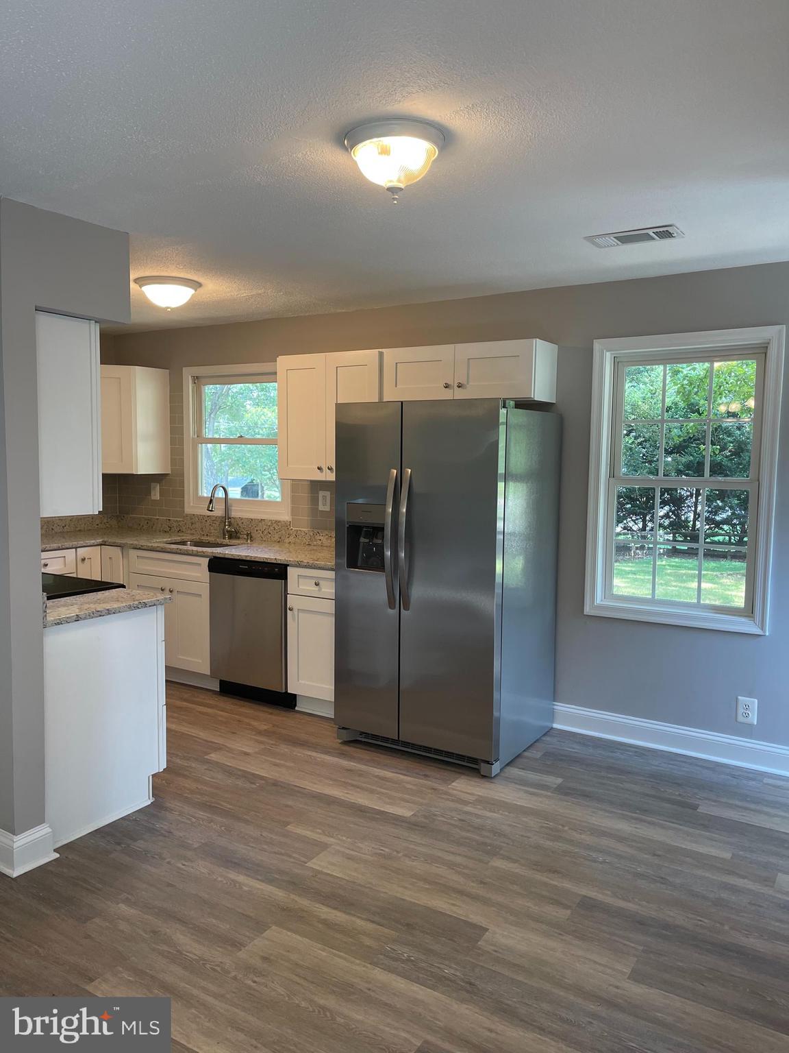12192 Cherry Hill Road Culpeper, VA 22701 - Photo 8 of 30 Water proof laminate floors thru out