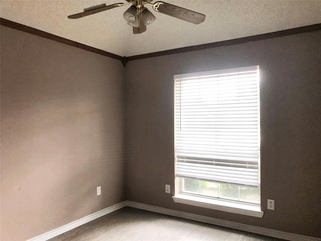 11409 Canoe Road Frisco, TX 75035 - Photo 15 of 19 a view of an empty room with a window