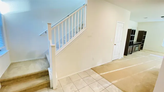 a view of a hallway with entryway