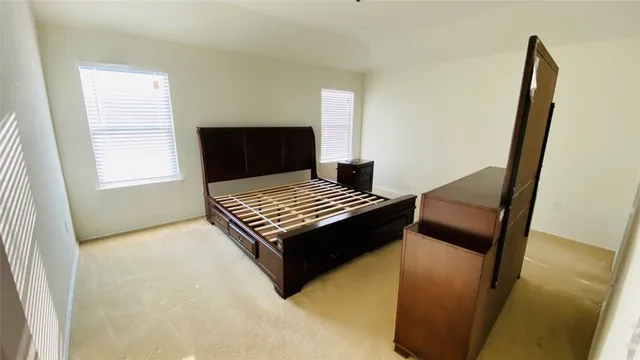 a view of bedroom and chair