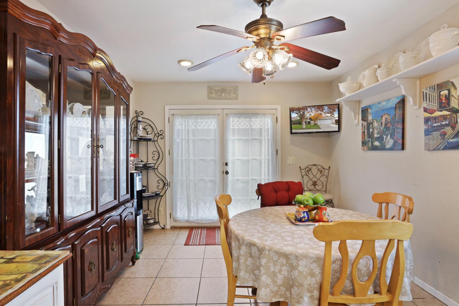 1601 Spring Court Tracy, CA 95376 - Photo 16 of 49 a dining room with furniture and window