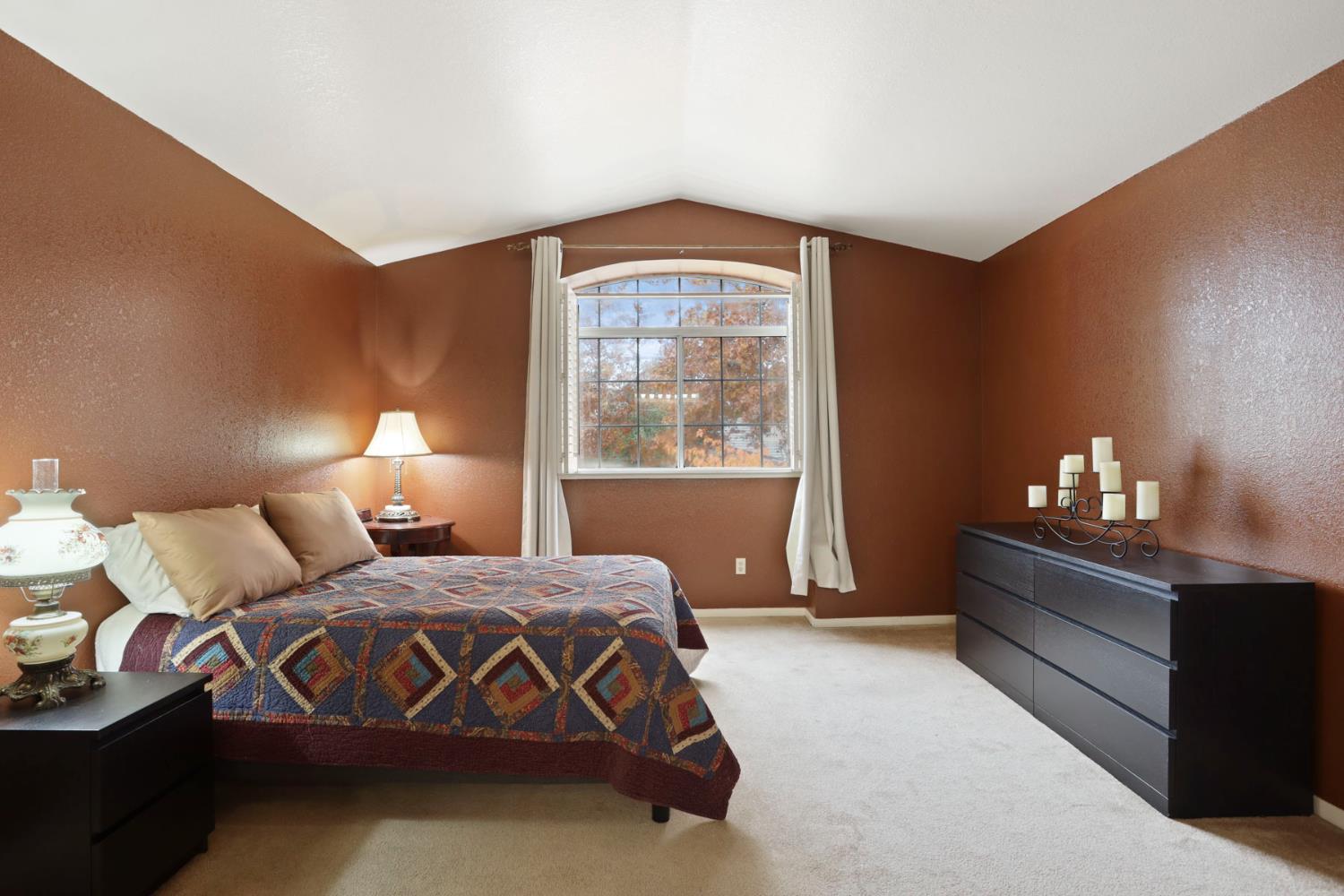 1601 Spring Court Tracy, CA 95376 - Photo 34 of 49 a bedroom with a bed and window